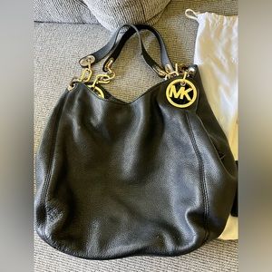 Michael Kors purse with matching wallet and dust cover